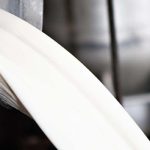 the-canisters-are-dumped-by-hand-into-scales-where-the-milk-is-weighed-each-farmers-milk-is-weighed-separately-to-determine-the-volume-of-milk-he-contributed-and-how-much-he-will-be-paid